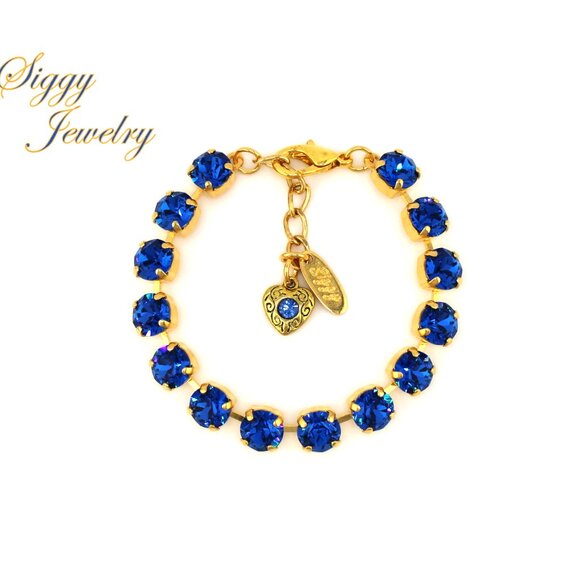 Capri Blue Tennis Bracelet made with Genuine Austrian Crystals in 8mm - Picture 1 of 7